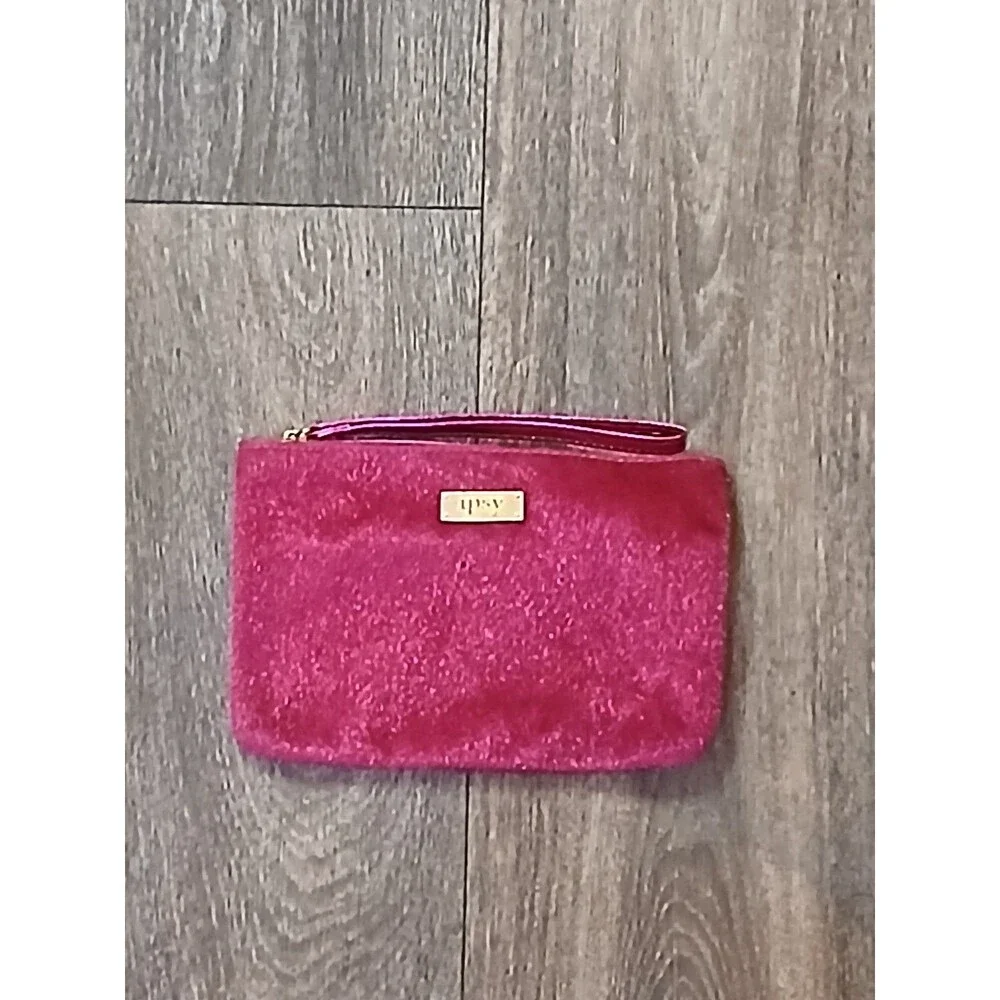 Pink fuzzy Ipsy cosmetic bag